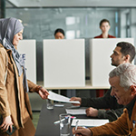 Women picking up vote at a polling station