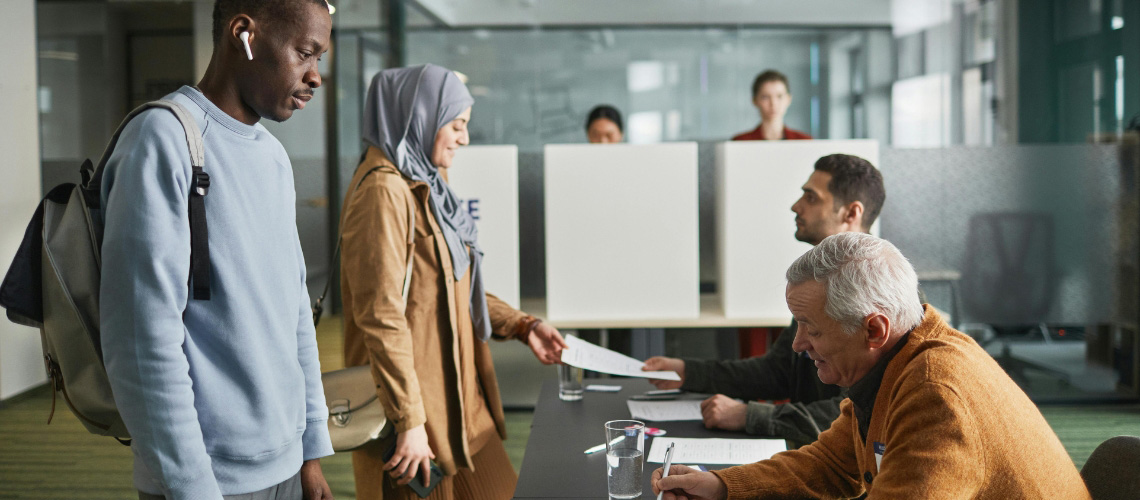 People voting at a polling station