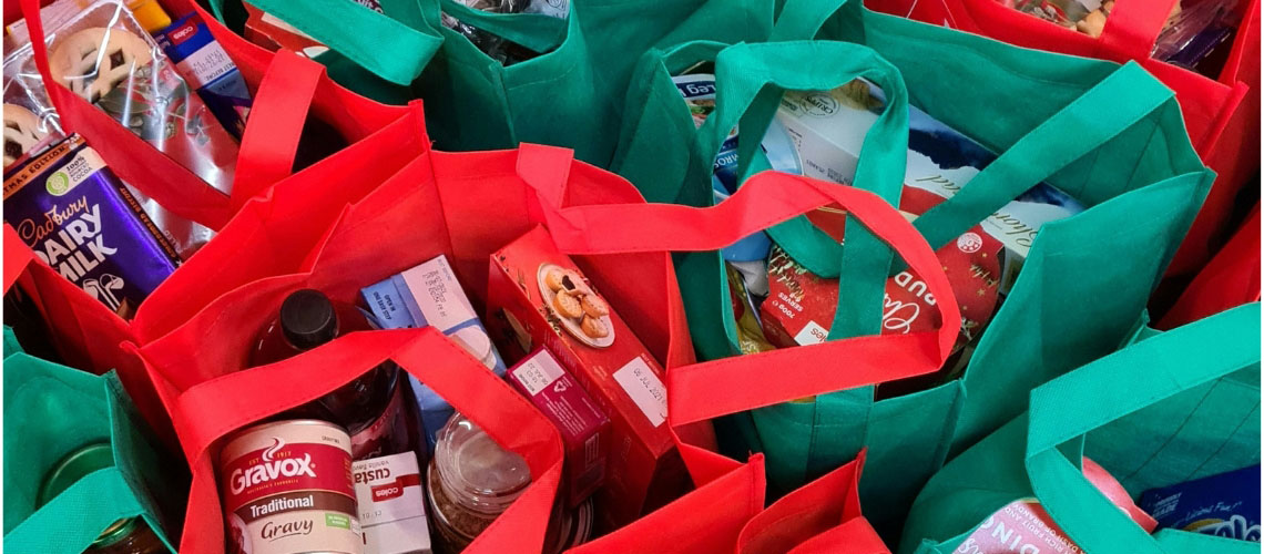 Looking down on bags full of food 