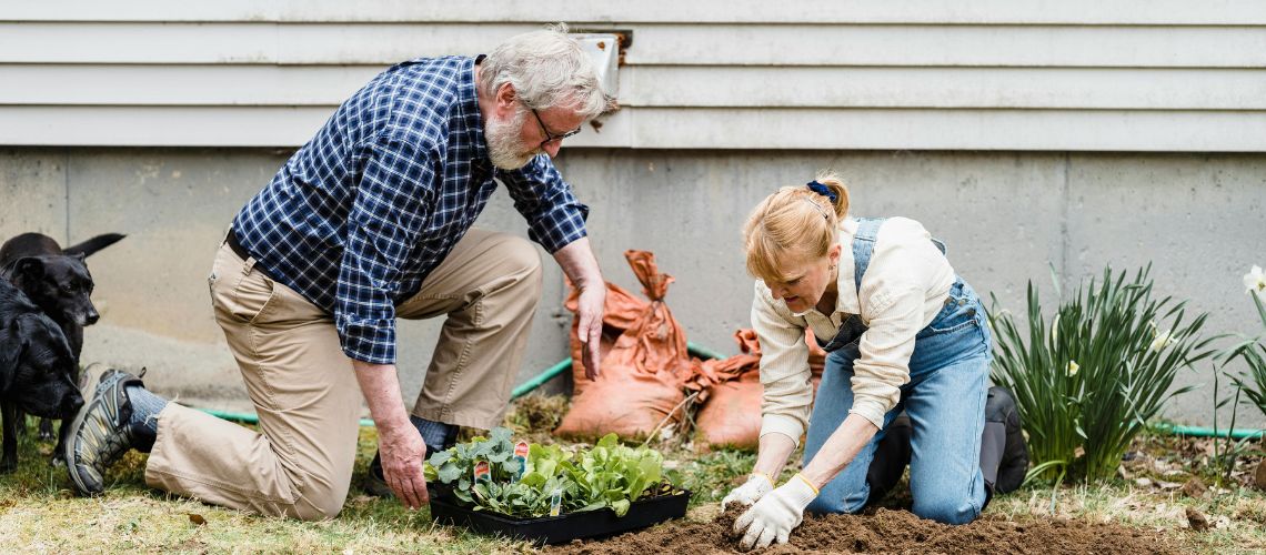 Man and women gardening