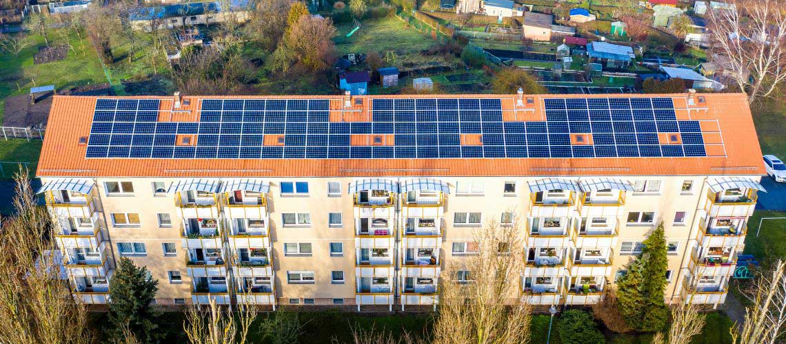 Block of flats with solar panels on the roof