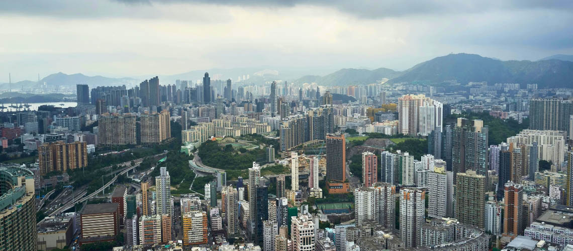 An aerial view of a city full of skscrapers