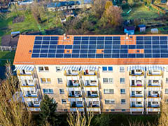 Block of flats with solar panels on the roof