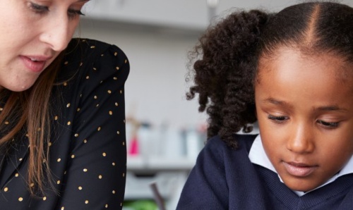 School child engaging in a learning activity