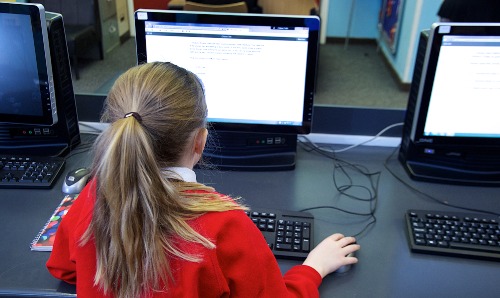 secondary pupil on computer