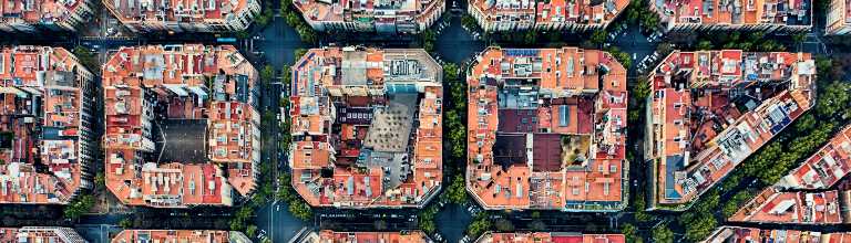 Aerial Zenital view of Barcelona's square blocks, old and new quarter, Barcelona, Spain.