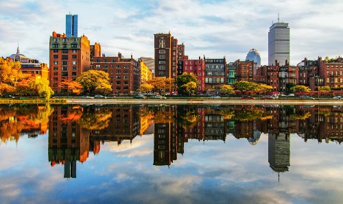 A horizontal shot of Back Bay neighborhood in Boston, Massachusetts, USA, with a cloudy white sky above.