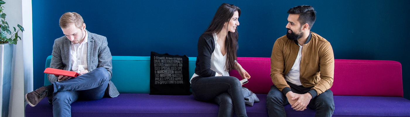 Taught master's students attending an open day, sat on couch