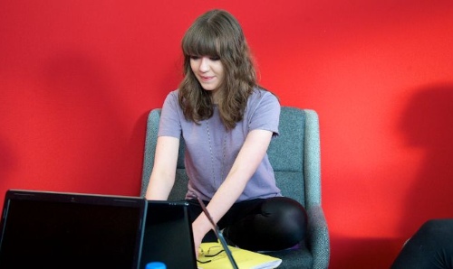 Geography student on her laptop